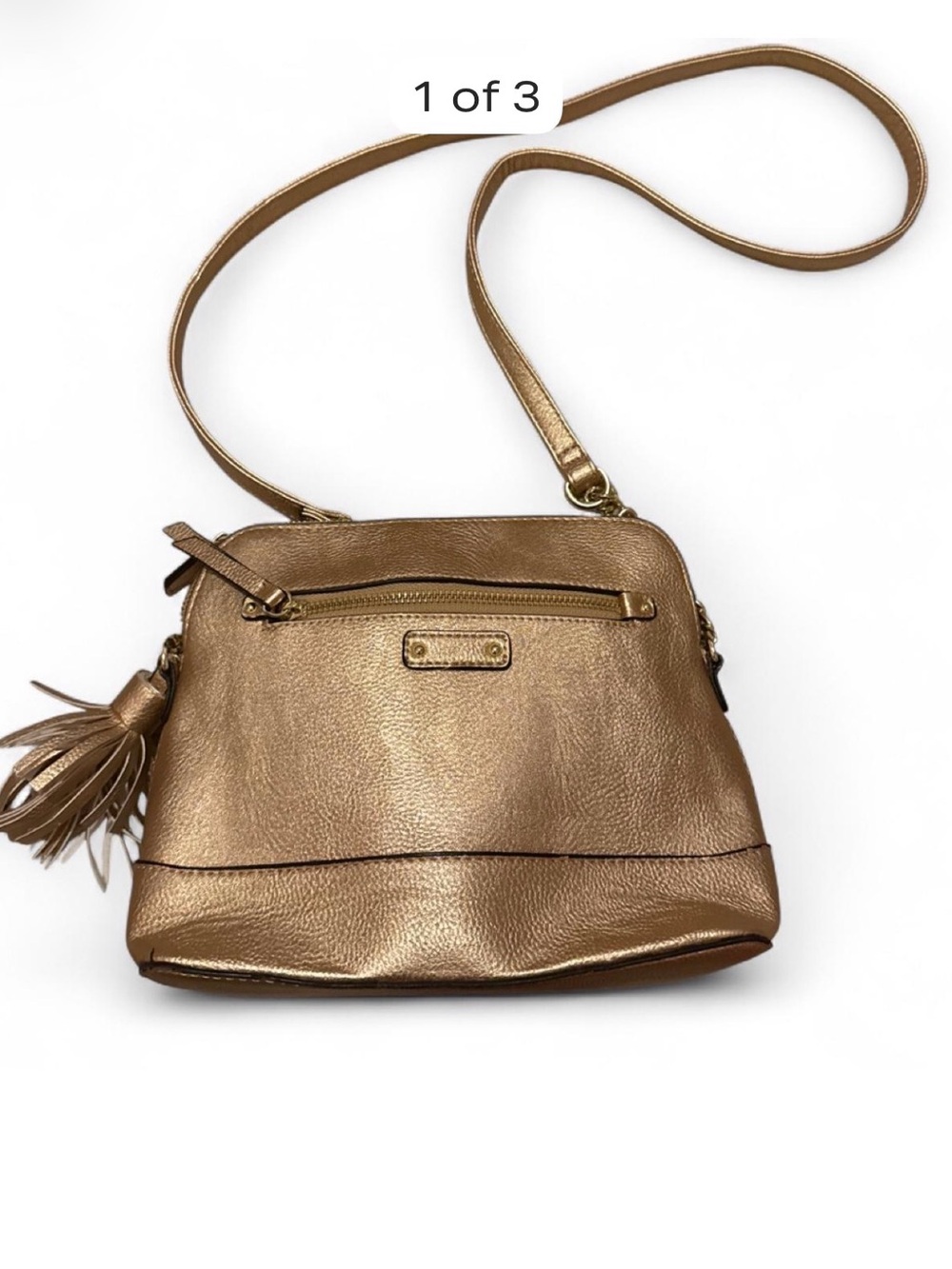 Sleek Metallic Gold Crossbody with Tassel Accent .. Like new